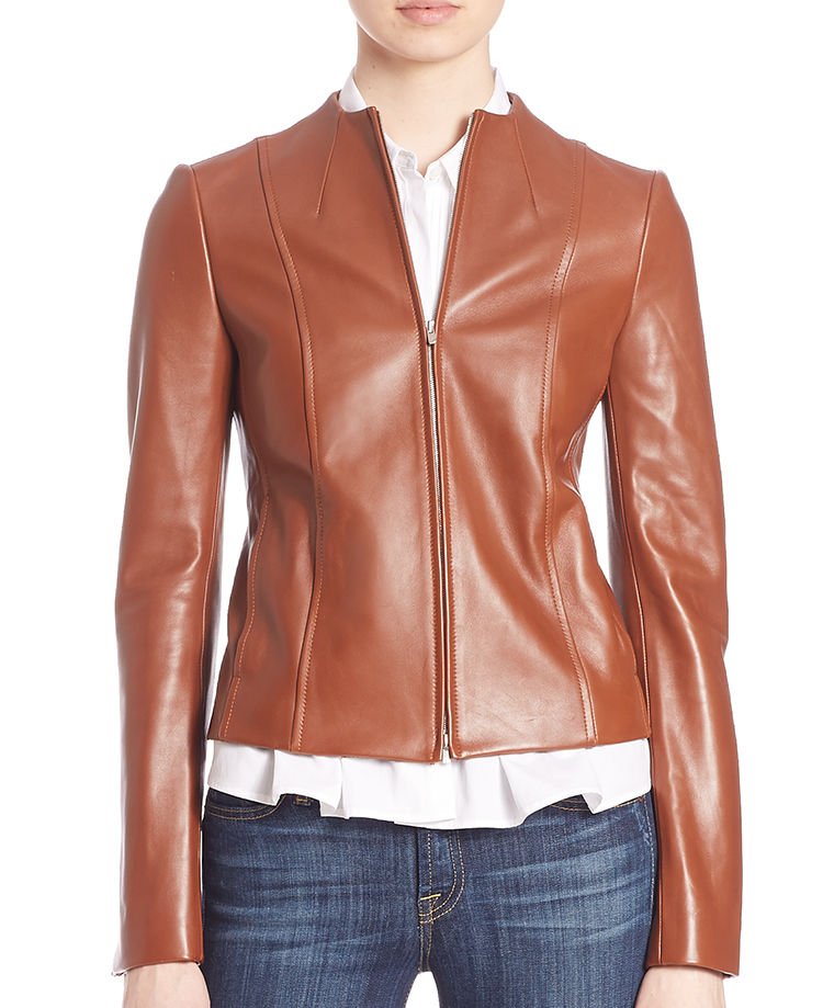 CLASSIC BROWN OZZANE WILMORE LEATHER JACKET AND WHITE DIONELLE SARTORIAL FLARED TOP BY THEORY. PHOTO: SAKS