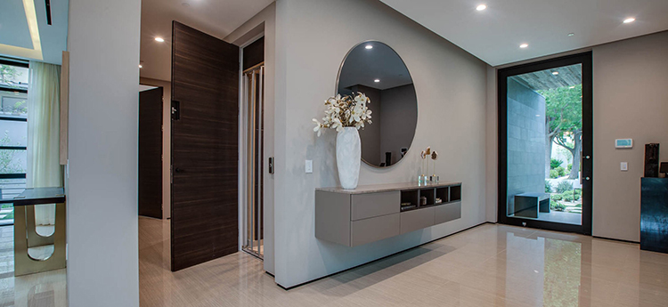 Modern residential elevator for seniors in a contemporary home, symbolizing comfort and accessibility while aging in place
