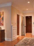 Residential hallway with a built-in home elevator designed to support safe aging in place
