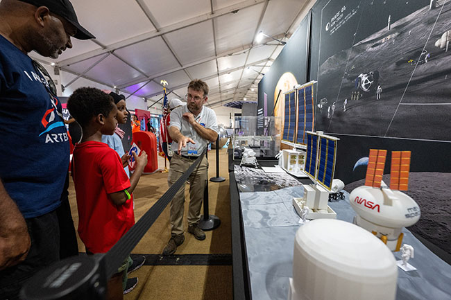 Visitors explore NASA exhibits at the Great American State Fair in Washington, D.C.