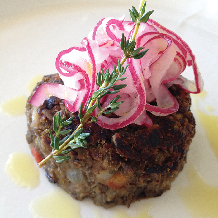 Veggie burger topped with pickled red onions, a diabetes-friendly summer recipe.
