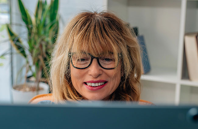 Woman exploring something new on her laptop